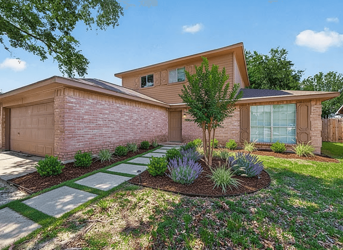 A front yard with a concrete pad pathway, a single crape myrtle tree, lavender, dwarf yaupon holly, and ornamental grasses.